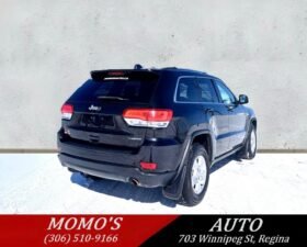 2014 Jeep Grand Cherokee Laredo 4×4 SUV.
